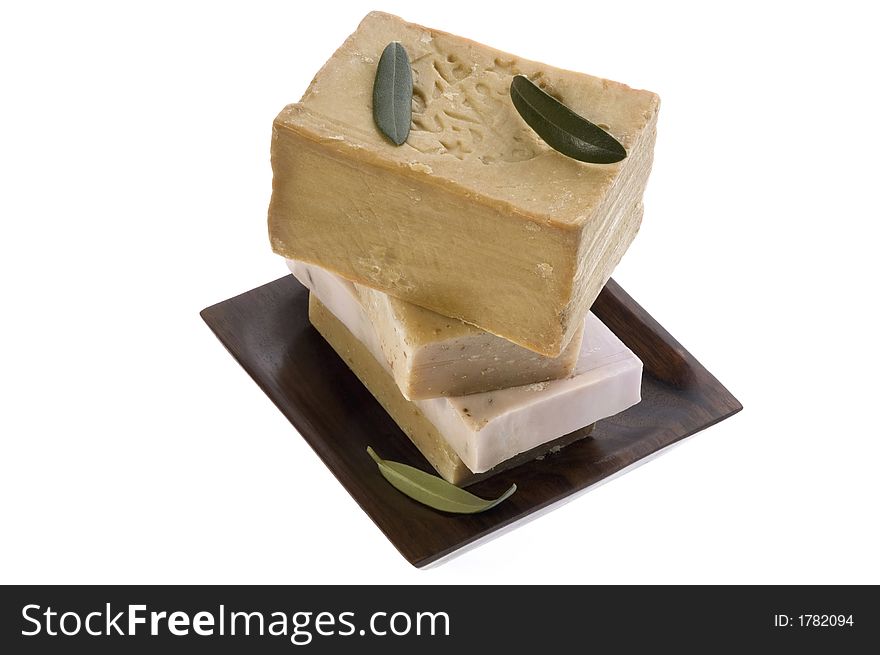 Spa. natural soaps and olive leaves isolated on the white background