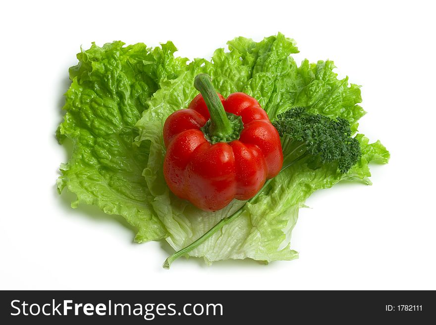 Red sweet pepper on a sheet of salad. Red sweet pepper on a sheet of salad