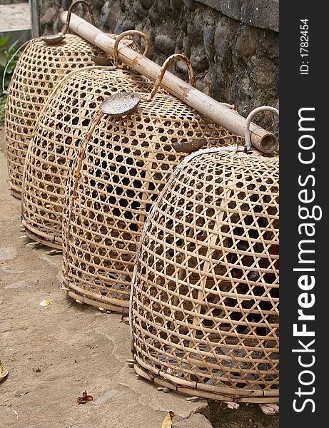 Woven basket cages used to house roosters, Bali. Woven basket cages used to house roosters, Bali