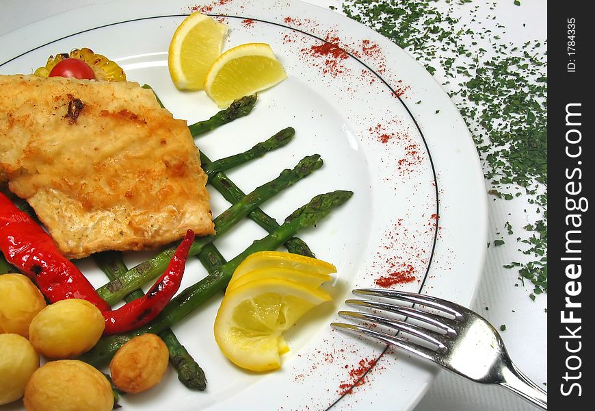 Oven fillet and potatoes on the decorated plate