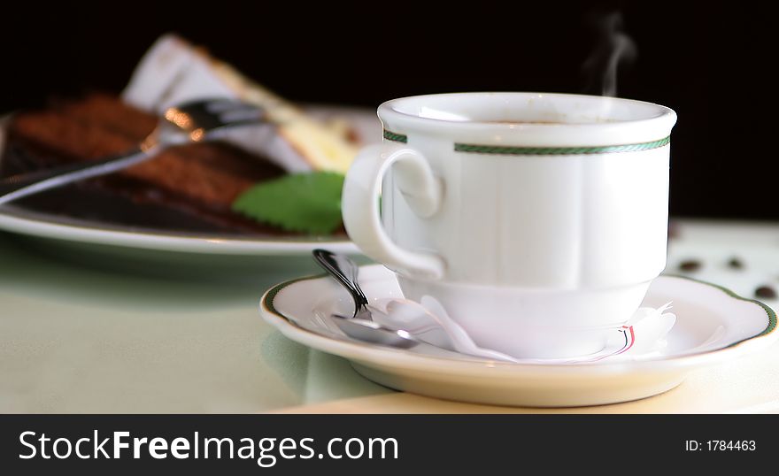 Cup of warm coffee with sugar and whipped cream