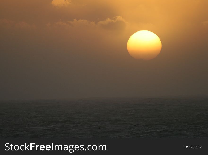 Golden Sunset over Rough Sea, California West Coast, Pacific Ocean