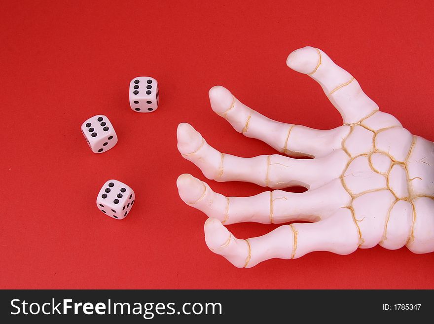 Hand of Death casting three dice to reveal 666 part of gambling abuse series. Hand of Death casting three dice to reveal 666 part of gambling abuse series.