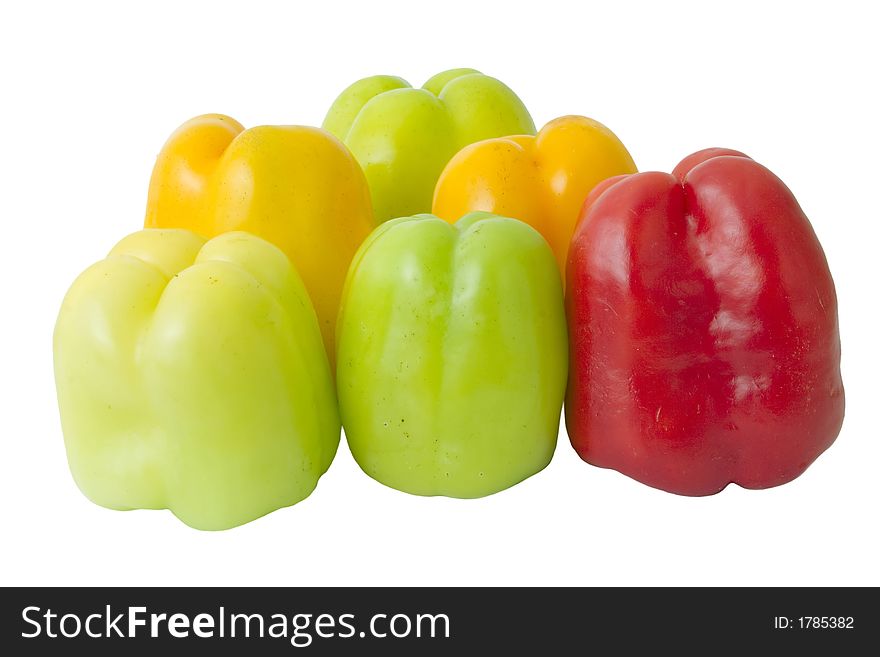 Group of red,green and yellow bellpeppers over white