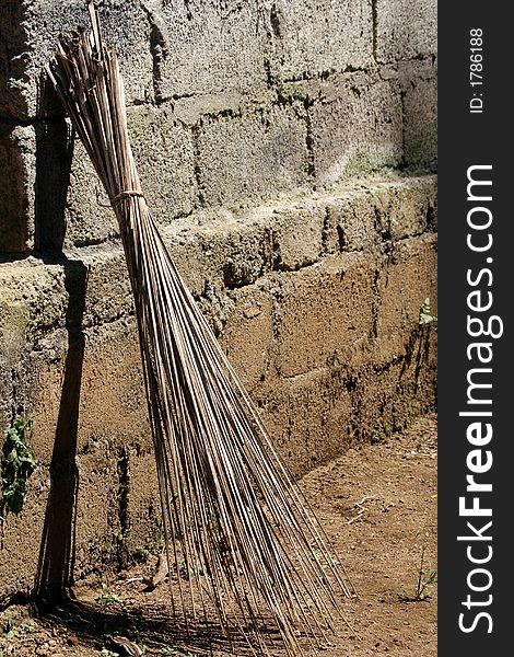 A Balinese broom made from slender bamboo sticks; when placed in the upright position it wards off evil spirits