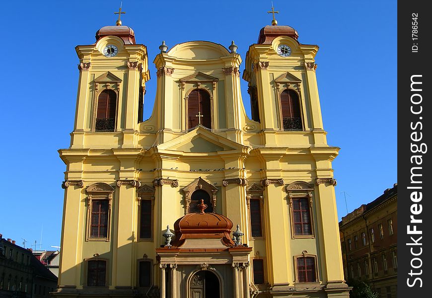 Bell And Clock Towers Against Clear Blue Sky