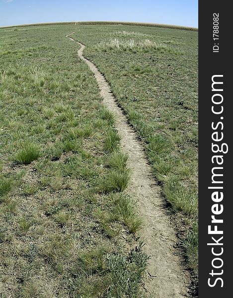 A Path In Steppe Leaving Over-the-horizon