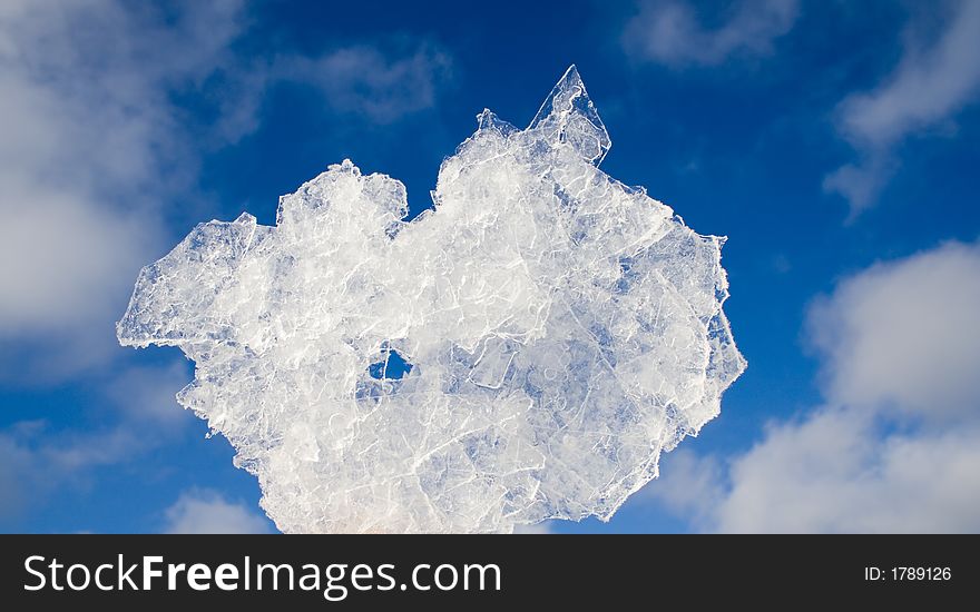 Bit of ice on sky background