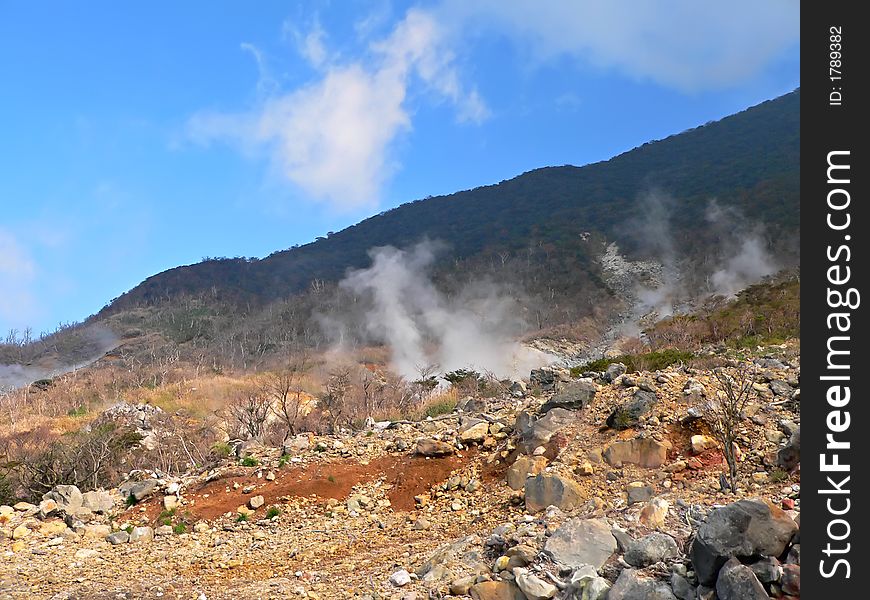 Hot steam clouds near volcano active area in Japan