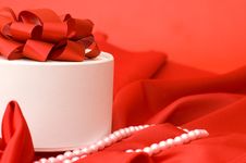 Box With A Gift On A Red Fabric Stock Image Box With A Gift On A Red Fabric Stock Image
