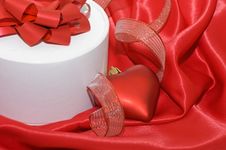 Box With A Gift On A Red Fabric Stock Photography Box With A Gift On A Red Fabric Stock Photography