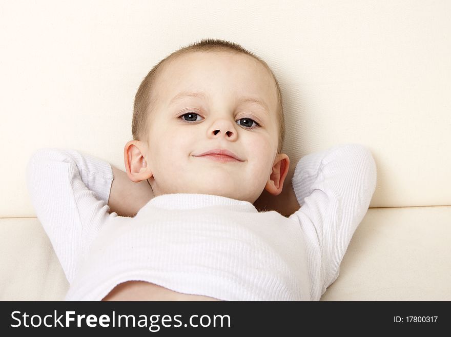 Cute boy on a sofa