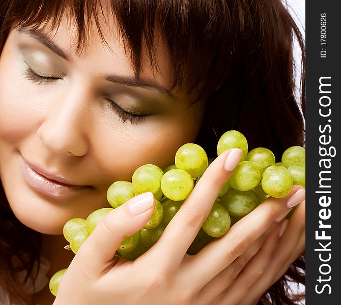 Young Woman With Green Grapes