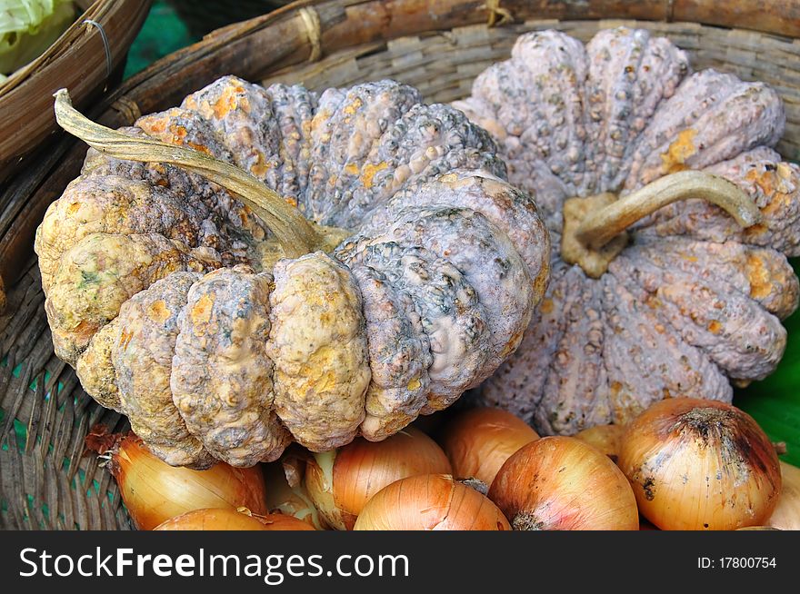 The pumpkin in the weaving basket at fresh market