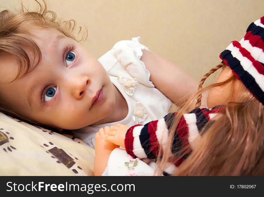 Little girl with doll