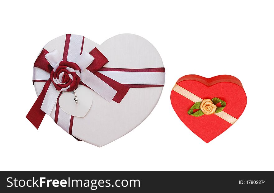 Holiday gift boxes decorated with ribbon isolated on white background.