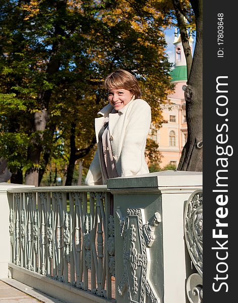 Charming young woman in an autumn park on nature