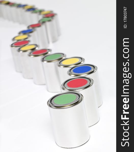 Colored paint cans in a row