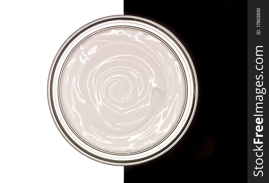 Paint can on black and white background