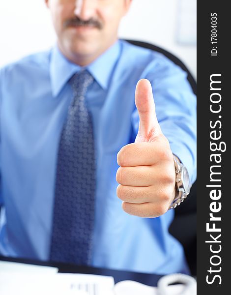 Mature businessman with blue shirt and tie