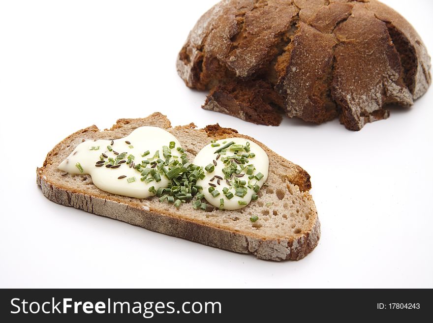 Cook cheese with caraway and chives on bread