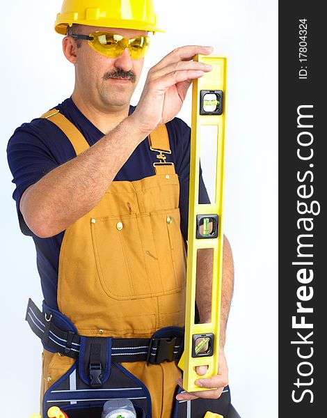 Mature contractor working. Over white background