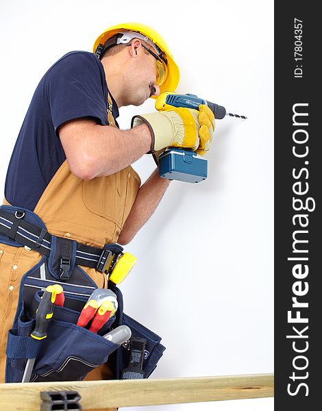 Mature contractor with a drill. Over white background. Mature contractor with a drill. Over white background