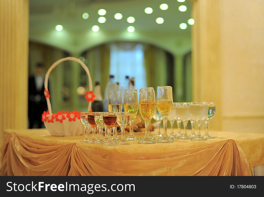 Various types of full glasses on the table at the restaurant