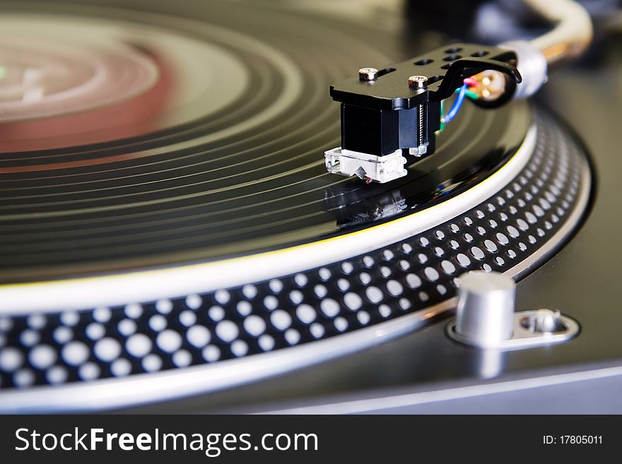 Turntable playing vinyl record