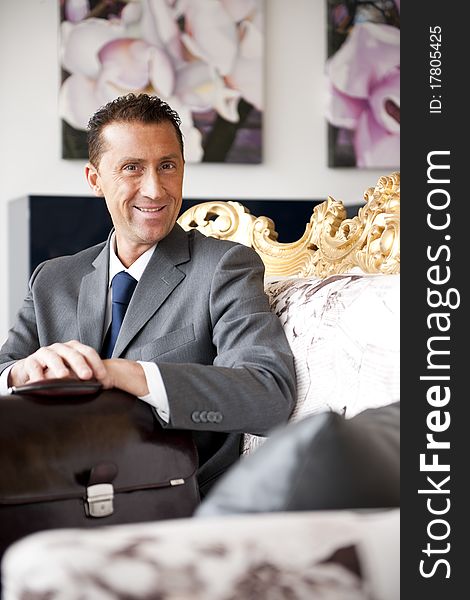 Businessman On A Vintage Sofa