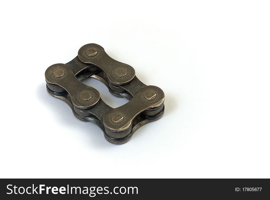 Segments of bicycle chain form a rectangle. Segments of bicycle chain form a rectangle.