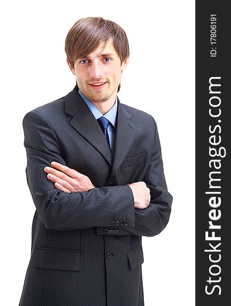 Young businessman standing against isolated white background. Young businessman standing against isolated white background