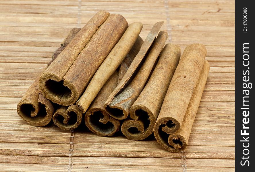 Cinnamon Sticks on bamboo background