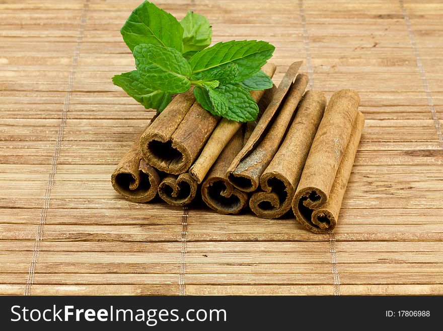 Cinnamon Sticks on bamboo background