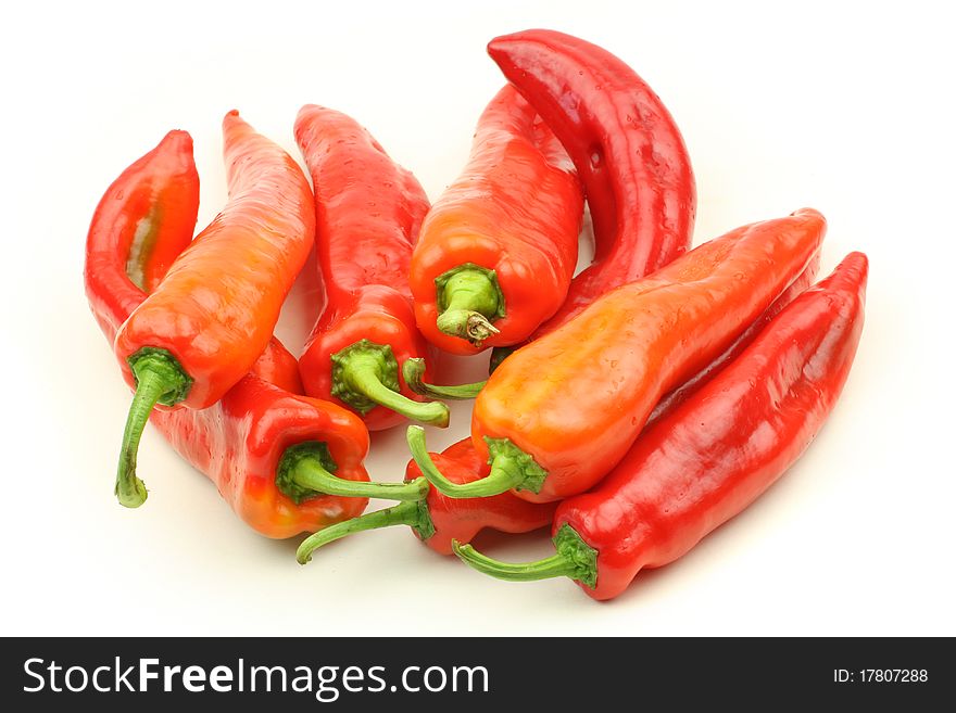 Red Peppers on white background.