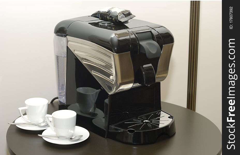 Style coffee machine on table with 2 small coffee cups. Style coffee machine on table with 2 small coffee cups
