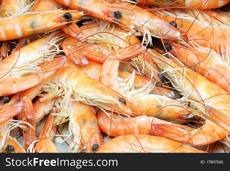 Group of cooked orange shrimp in closeup, can be used as background. Group of cooked orange shrimp in closeup, can be used as background