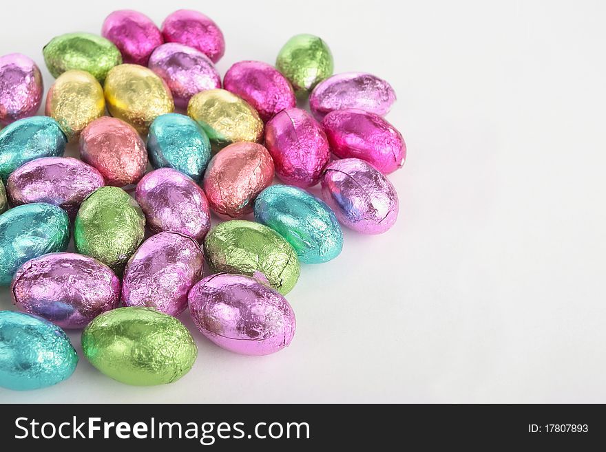 Colorefd Easter Eggs Over White