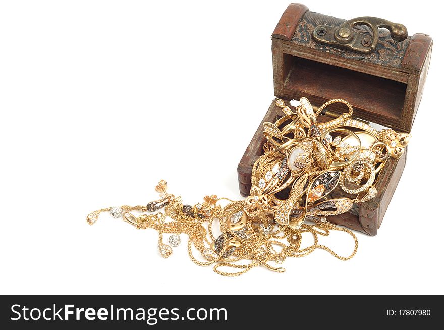 Fashion gold jewelry in wooden box, isolated on white background. Fashion gold jewelry in wooden box, isolated on white background