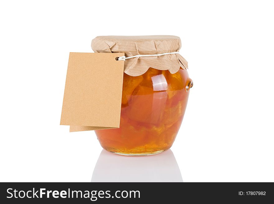 Jar with sweet of pumkins isolated on white background