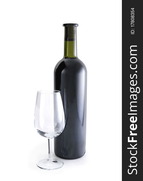 Corked bottle of red wine and an empty glass isolated on white background with clipping path. Corked bottle of red wine and an empty glass isolated on white background with clipping path