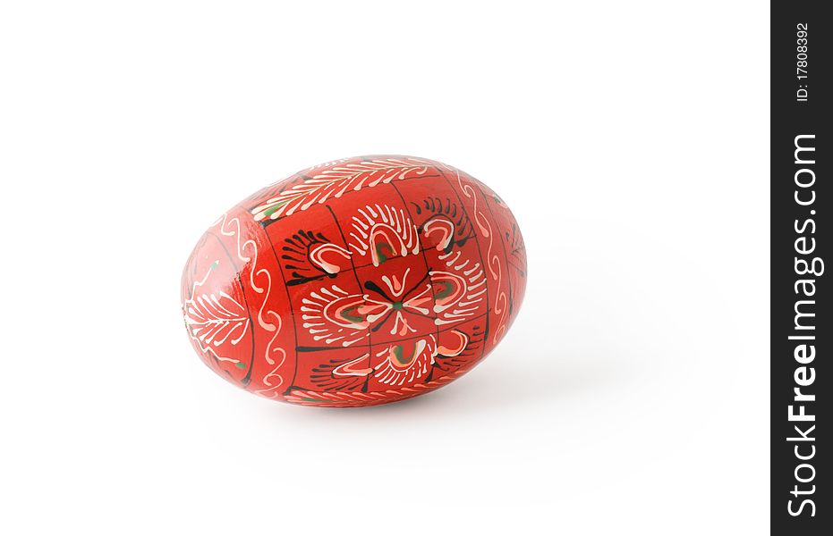 Red painted traditional Easter egg isolated on white background with shadow. Clipping path included. Red painted traditional Easter egg isolated on white background with shadow. Clipping path included.