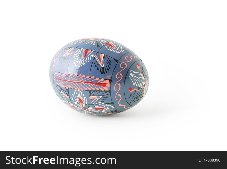 Blue painted traditional Easter egg isolated on white background with shadow. Clipping path included. Blue painted traditional Easter egg isolated on white background with shadow. Clipping path included.