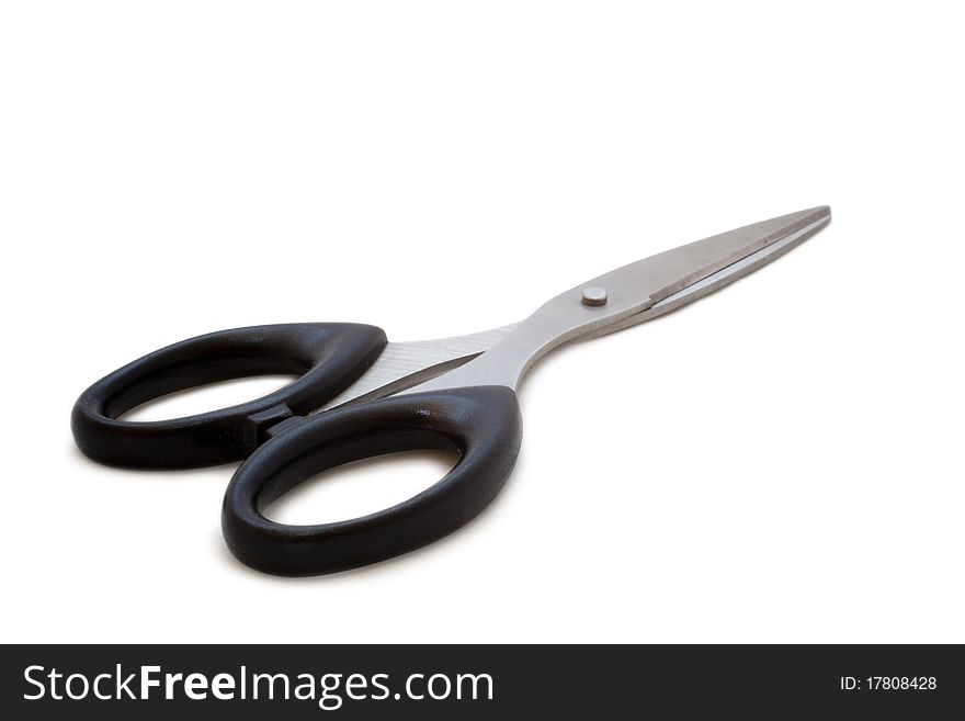 Silver steel scissors isolated on white background