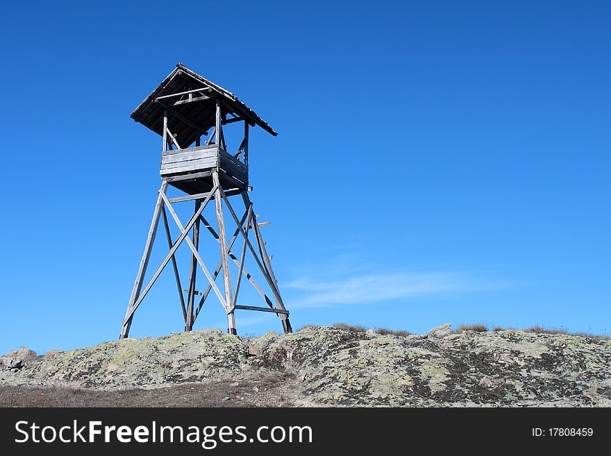 Wooden raised hide for hunting. Wooden raised hide for hunting