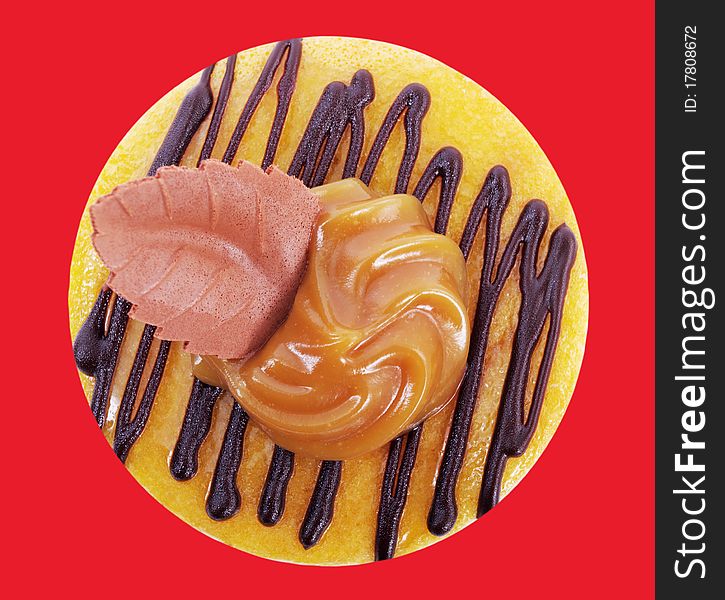 Ring of cake isolated on the red background. Ring of cake isolated on the red background.