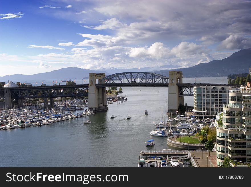 Boats passing underneath Granville bridge, Vancouver Canada