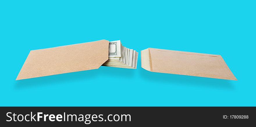 Two paper bags and dollars isolated on the blue background with clipping paths. Two paper bags and dollars isolated on the blue background with clipping paths.