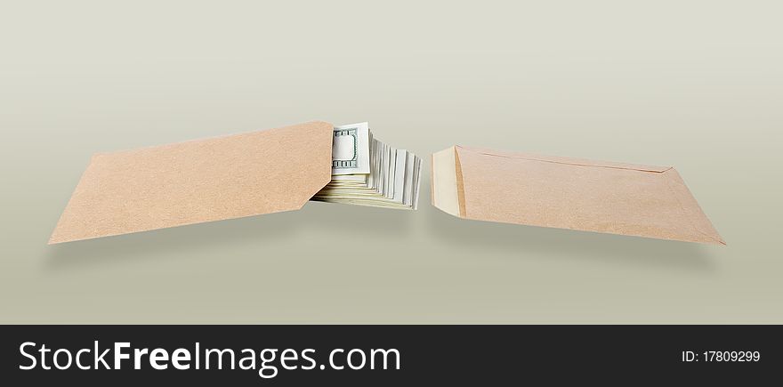 Two paper bags and dollars isolated on the gray background. Two paper bags and dollars isolated on the gray background.