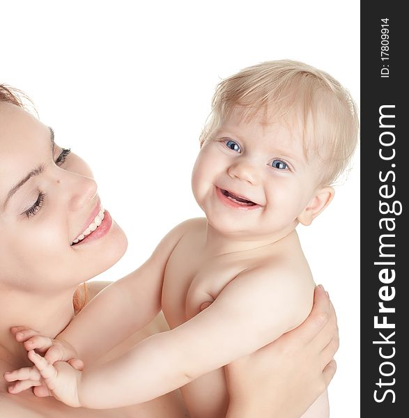 Closeup faces of happy mother with cute baby girl